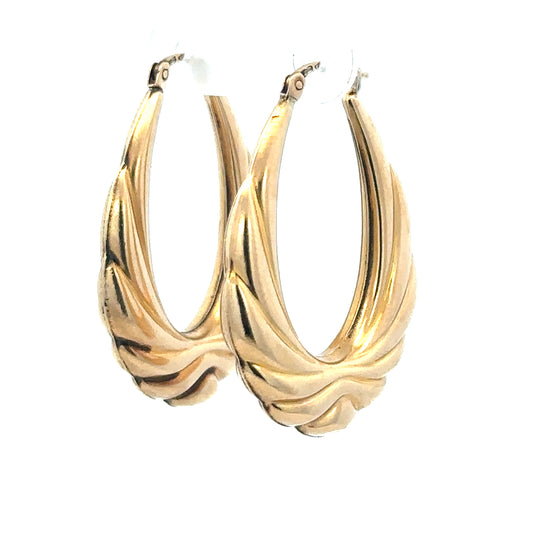 9ct yellow gold hoop earrings weighing 3.8g, unbranded, with a classic circular design and polished finish.