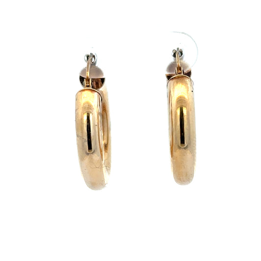 9ct yellow gold hoop earrings weighing 3.9g, featuring a classic circular design and polished finish.