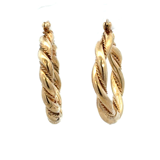 9ct yellow gold hoop earrings weighing 4.9g, featuring a classic round design with a secure clasp.
