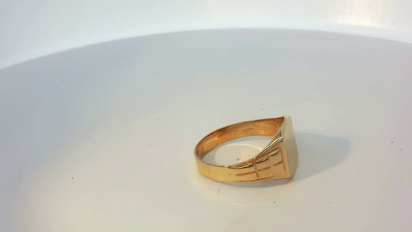 9ct yellow gold ring with smooth polished finish, unbranded jewelry, showcasing a simple elegant design on a white background.