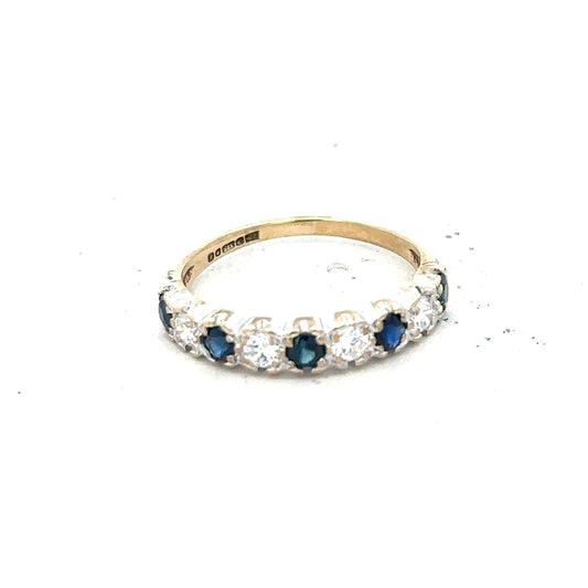9ct yellow gold ring in size J with a smooth polished band, unbranded jewelry, detailed close-up shot.