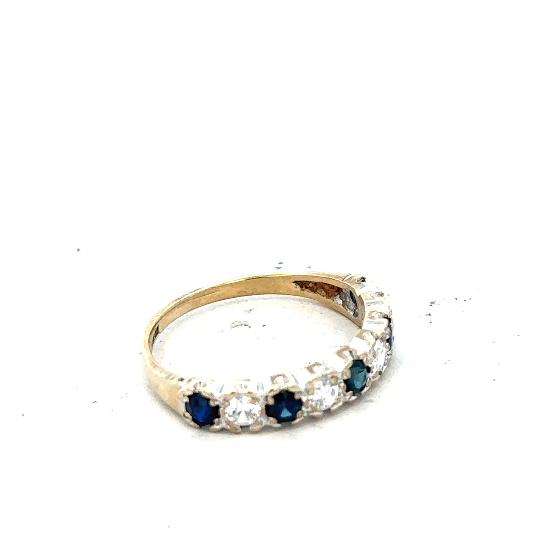 9ct yellow gold ring in size J, featuring a sleek, polished band with a simple, elegant design.