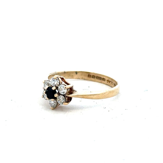 9ct yellow gold ring in size L with a simple, elegant band, unbranded jewelry piece displayed on a plain background.