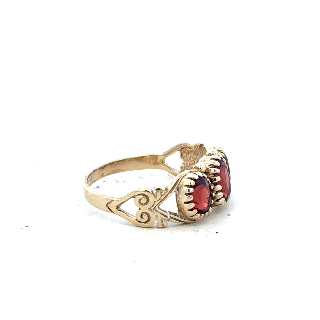 9ct yellow gold ring in size L with a smooth band, displayed on a plain background.