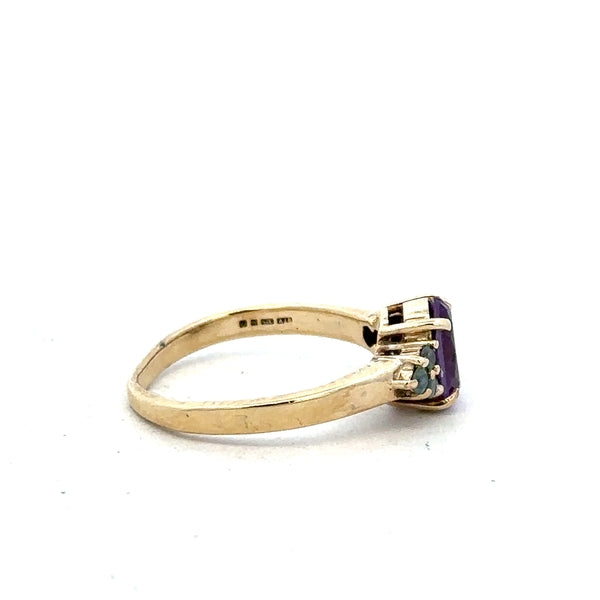 9ct yellow gold ring in size M, featuring a smooth polished band, unbranded jewelry piece on a neutral background.