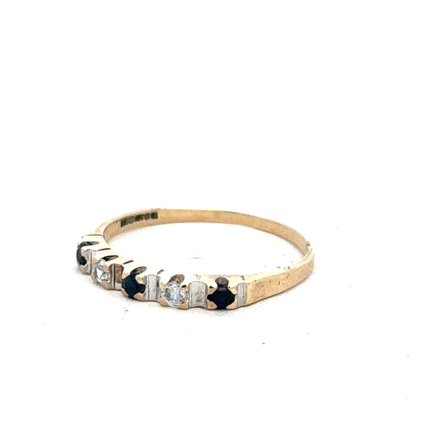 9ct yellow gold ring in size P with a smooth band, unbranded, showcasing a classic jewelry style.