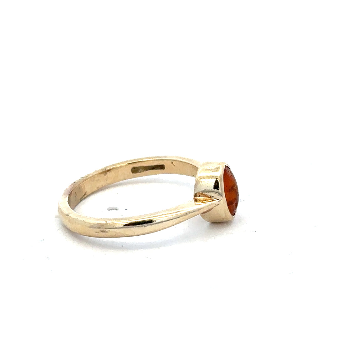 9ct yellow gold ring in size P, featuring a smooth polished band, unbranded jewelry, close-up view.