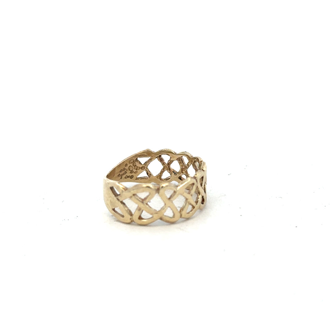 9ct yellow gold ring in size P with a simple band design, unbranded jewelry piece suitable for everyday wear.