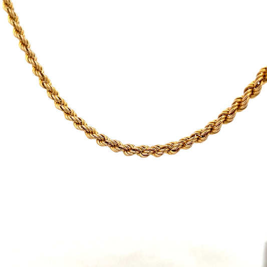 9ct yellow gold rope chain weighing 9.4g, showcasing a detailed twisted design and polished finish.