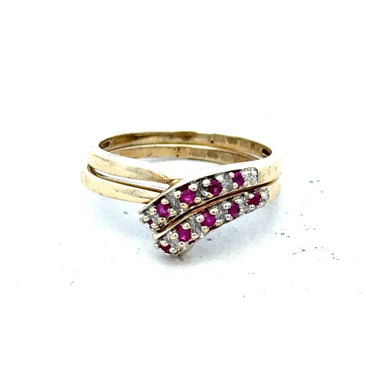 9ct yellow gold ruby ring in size O with a central red gemstone, featuring a polished gold band and elegant design.