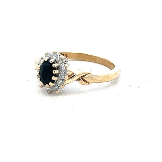 9ct yellow gold sapphire and diamond ring, size K1/2, showcasing a sparkling gemstone and elegant gold band.