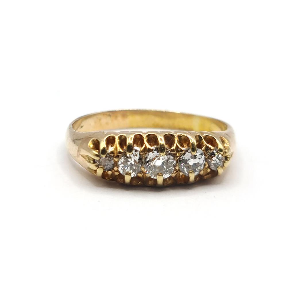 Antique 18ct yellow gold diamond ring with five old cut diamonds totaling 0.57 carats, vintage jewelry piece.