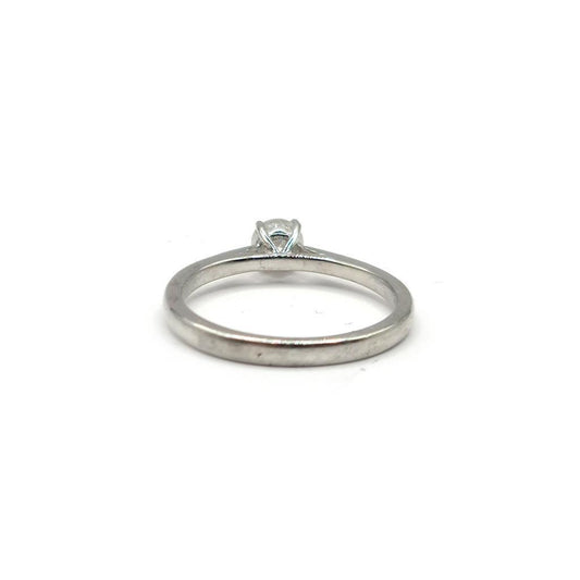 Platinum 0.26 carat diamond solitaire ring with a single sparkling diamond set on a sleek band.