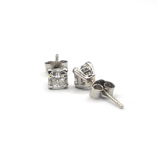 Platinum 1.00 carat GIA certified diamond stud earrings with color G and clarity VS2, featuring classic solitaire design.