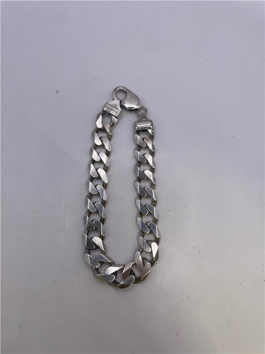 Silver bracelet weighing 34.5g with a sleek, polished finish, featuring a simple and elegant design.