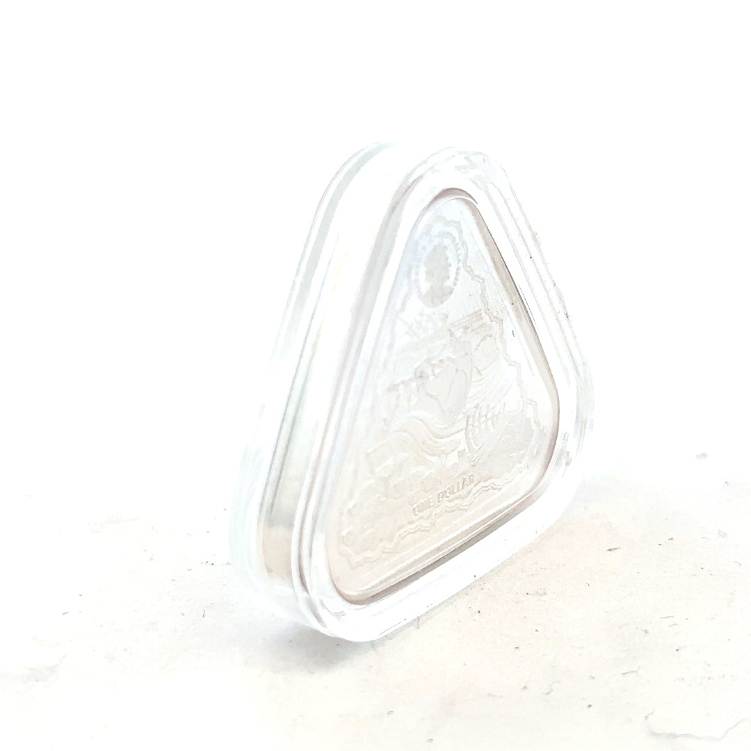 Silver coin weighing 31.8g with detailed design, unbranded, shown on a neutral background in this high-quality image.