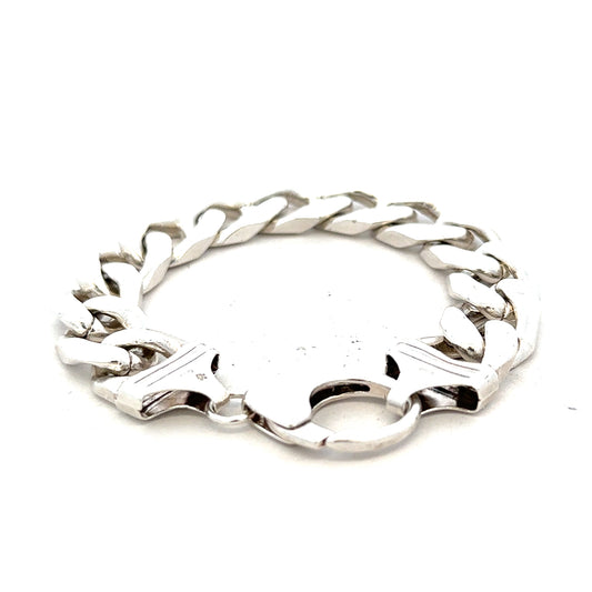 Silver curb bracelet weighing 81.4g with a classic chain design, unbranded jewelry accessory shown in the image.