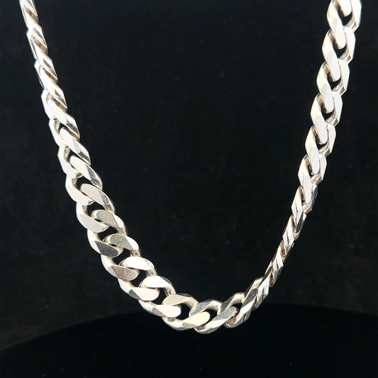 Silver curb chain weighing 109.9g with a sleek design, displayed on a plain background.