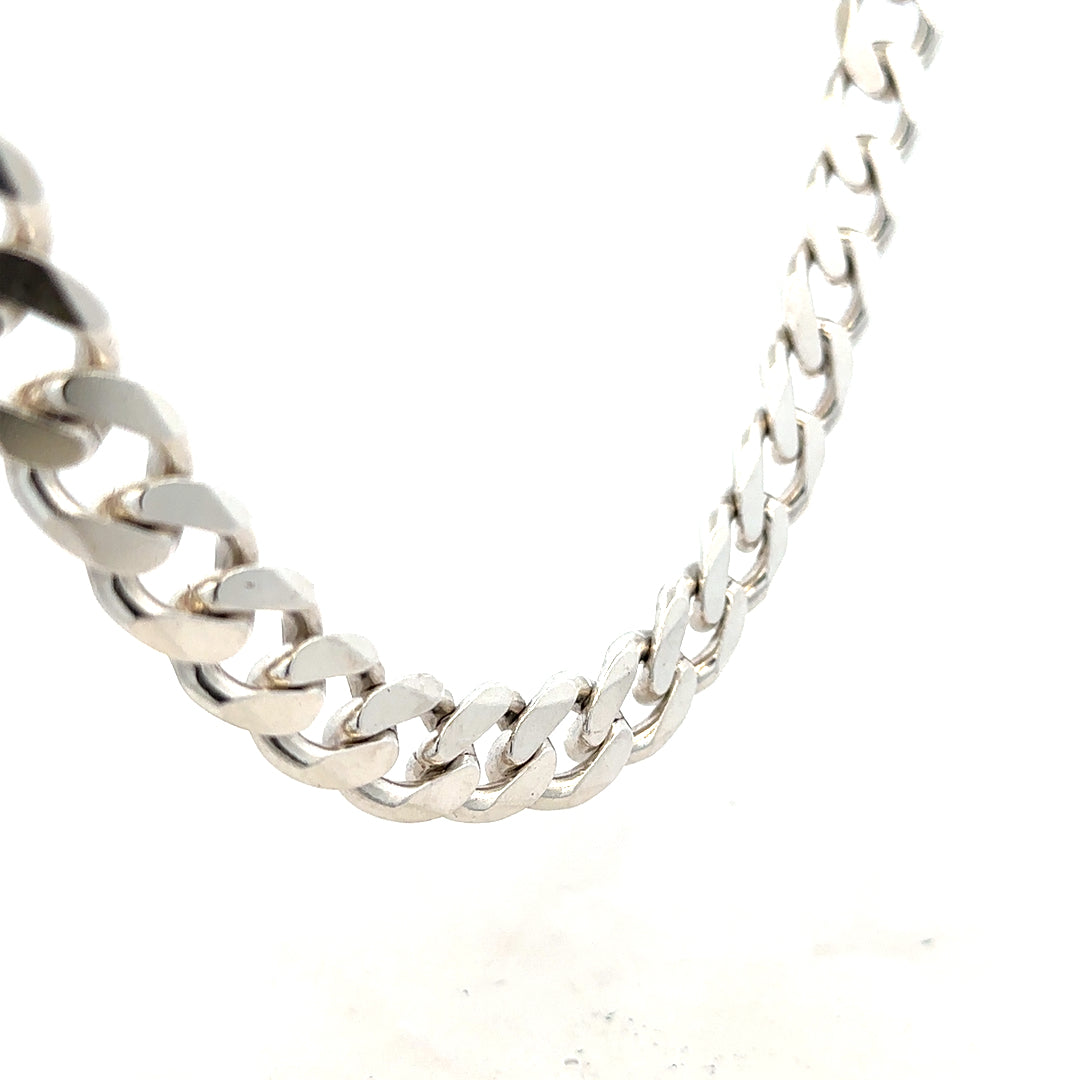 Silver curb chain weighing 146.6g with a classic design, shown laid flat against a neutral background.