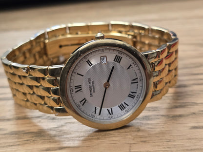 Raymond Weil Geneve gold-plated quartz watch with white Roman numeral dial and date display