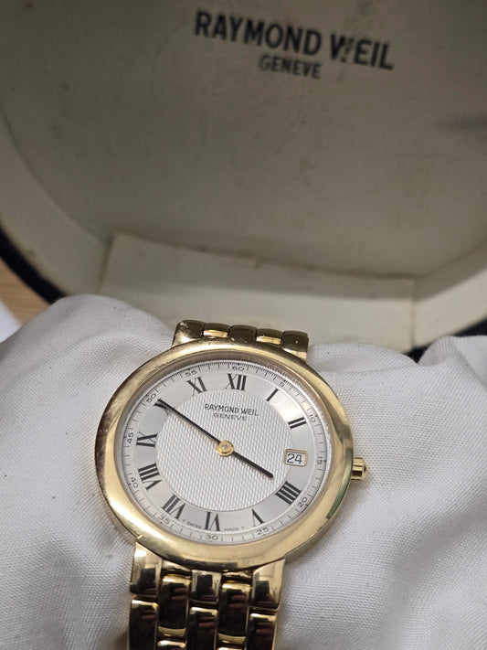 Raymond Weil Geneve gold-plated quartz watch with white Roman numeral dial and date display