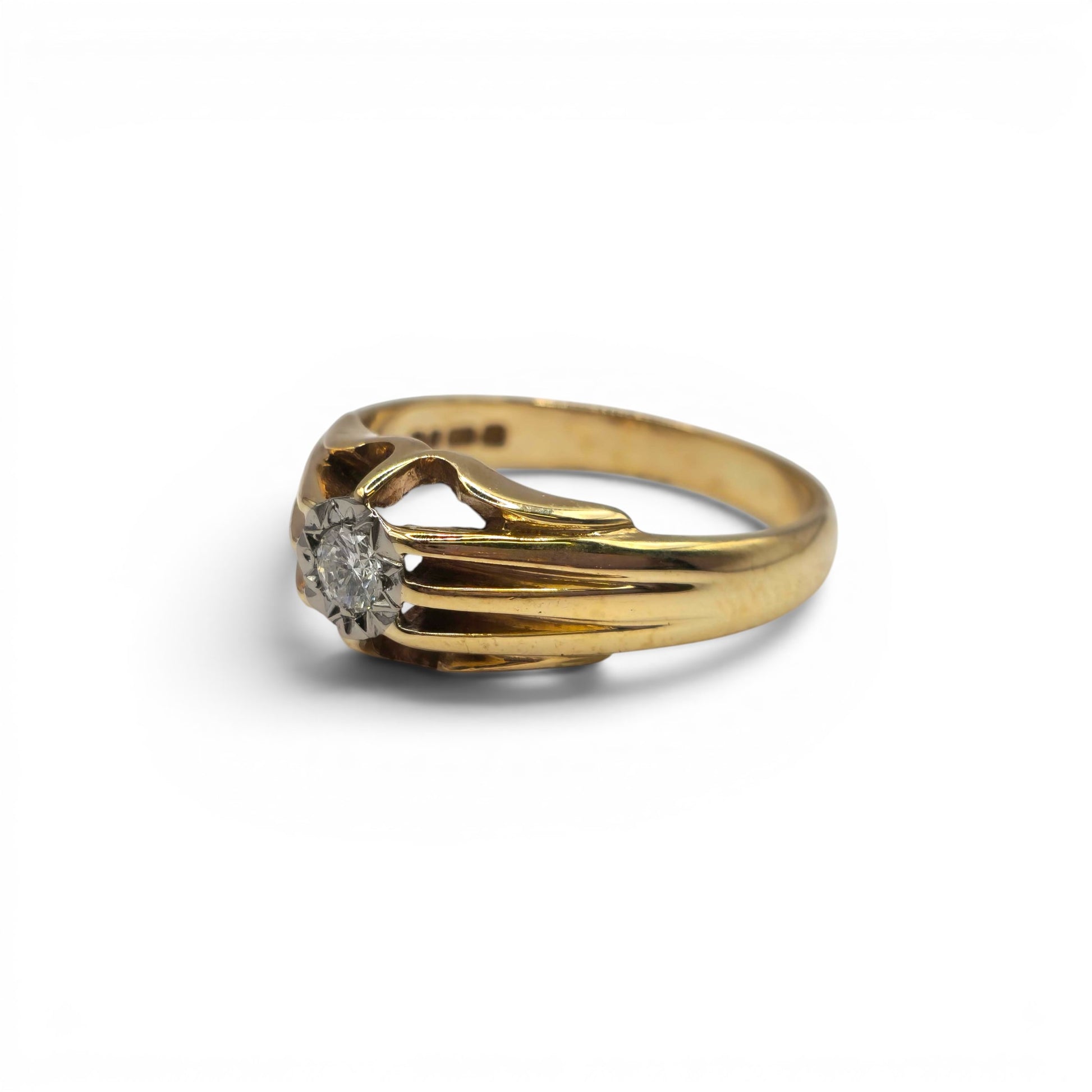 9ct yellow gold diamond ring by Reeves and Sons with sparkling diamonds, elegant design, and a polished finish.