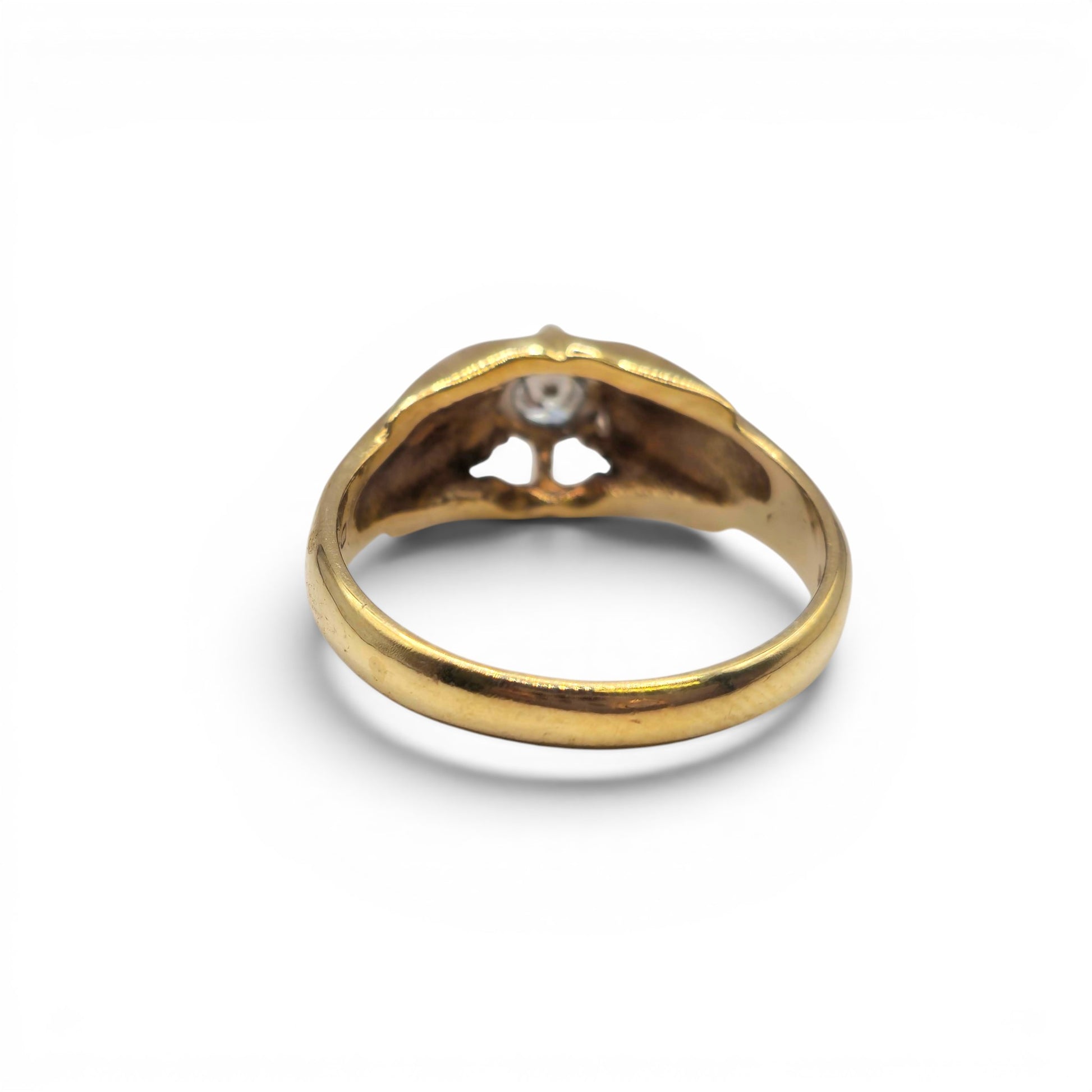 9ct yellow gold diamond ring by Reeves and Sons, showcasing a sparkling diamond centerpiece on a polished gold band.