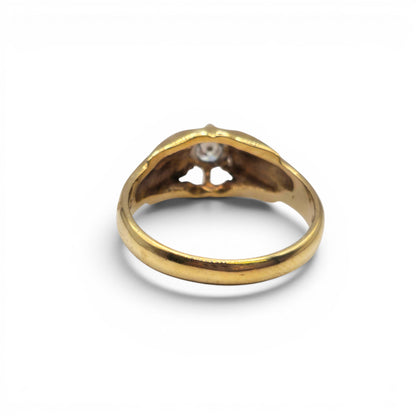 9ct yellow gold diamond ring by Reeves and Sons, showcasing a sparkling diamond centerpiece on a polished gold band.