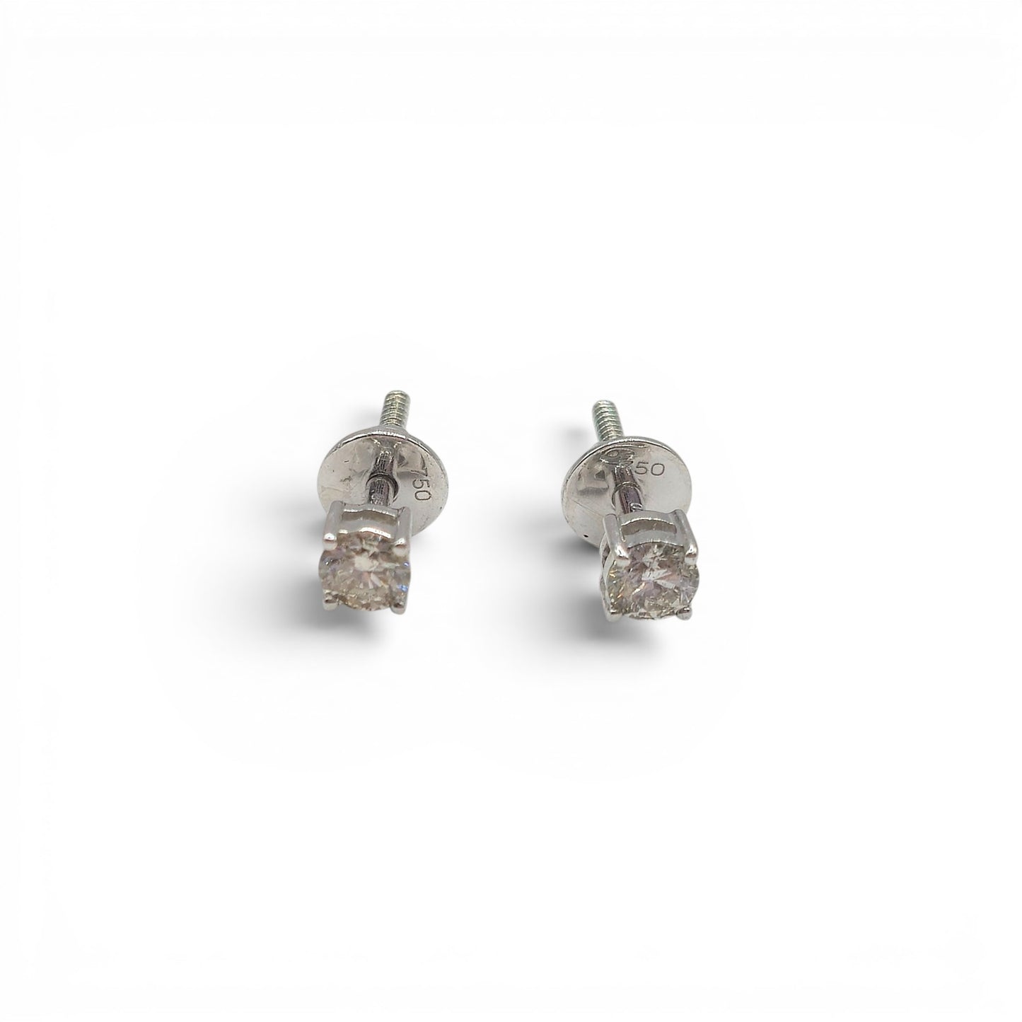 18ct white gold diamond stud earrings with sparkling diamonds, featuring a classic design from Reeves and Sons.