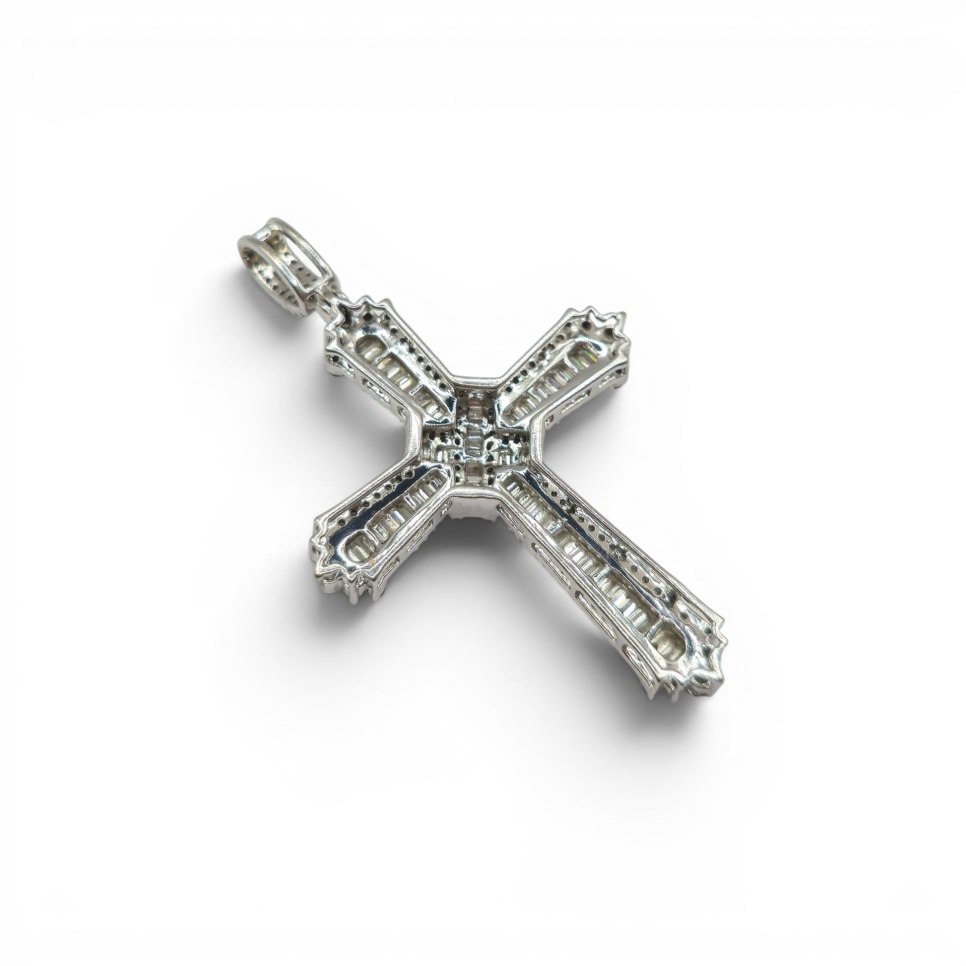 9ct white gold diamond cross pendant by Reeves and Sons, featuring sparkling diamonds on a sleek cross design.