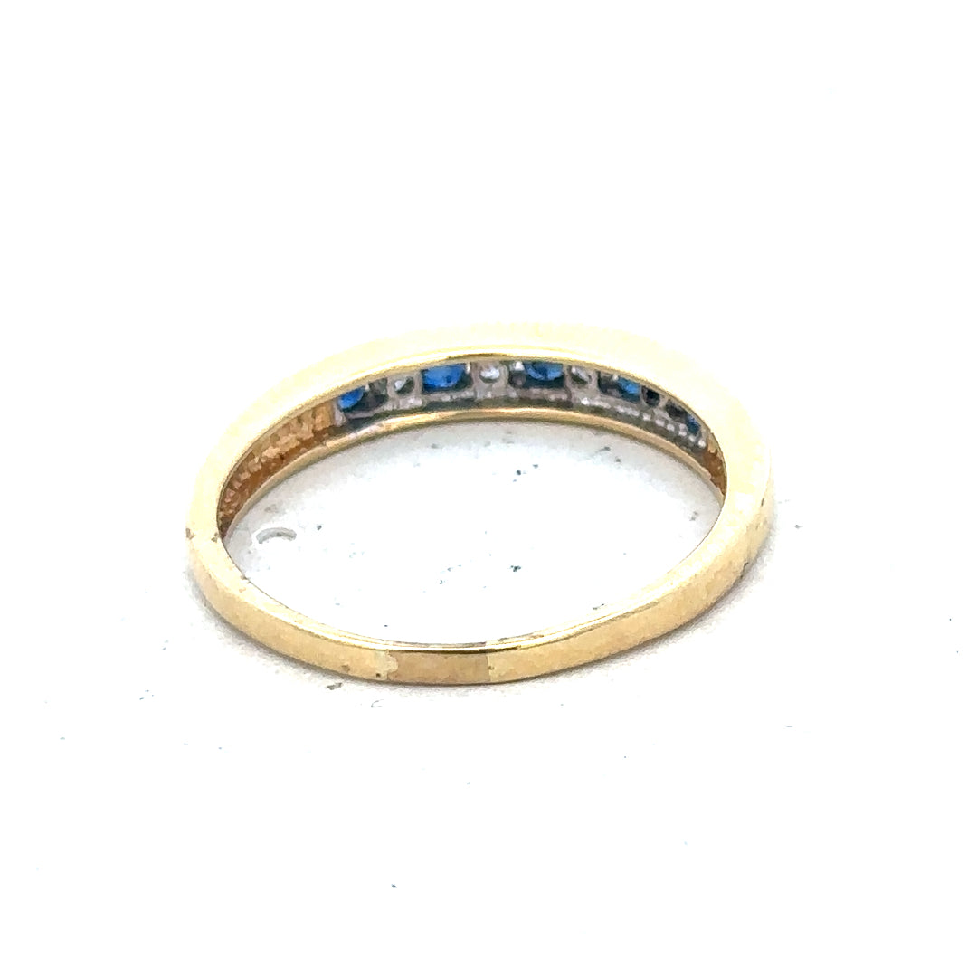 18ct yellow gold sapphire and diamond ring, size S, with elegant stones and a delicate band, weighing 3.3g.
