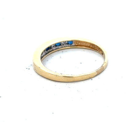 18ct yellow gold sapphire and diamond ring, size S, with intricate design and sparkling gemstones.