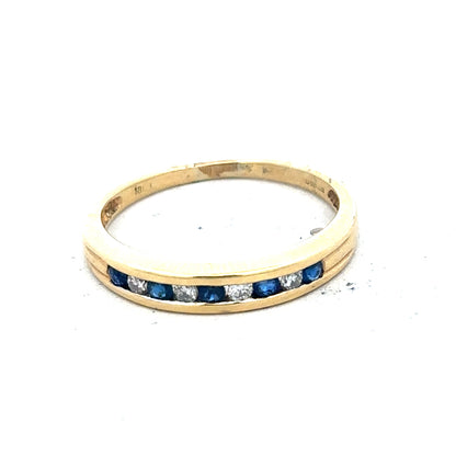 18ct yellow gold sapphire and diamond ring, size S, featuring a central sapphire gemstone with diamond accents.