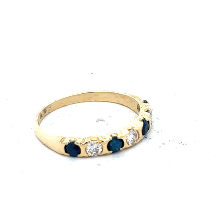 18ct yellow gold diamond and sapphire ring, size M 1/2, featuring sparkling gemstones and elegant craftsmanship.