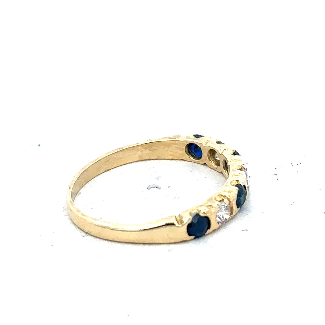 18ct yellow gold diamond and sapphire ring in size M 1/2, featuring a sparkling gemstone design and elegant craftsmanship.