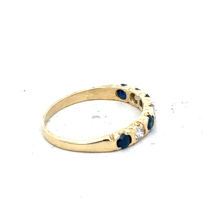 18ct yellow gold diamond and sapphire ring in size M 1/2, featuring a sparkling gemstone design and elegant craftsmanship.