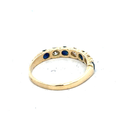 18ct yellow gold diamond and sapphire ring in size M 1/2, featuring a detailed design with sparkling gemstones.