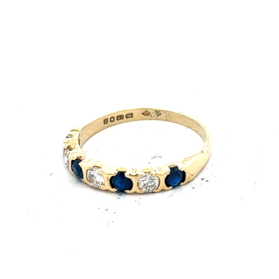 18ct yellow gold diamond and sapphire ring, size M 1/2, featuring a detailed design with sparkling gemstones.