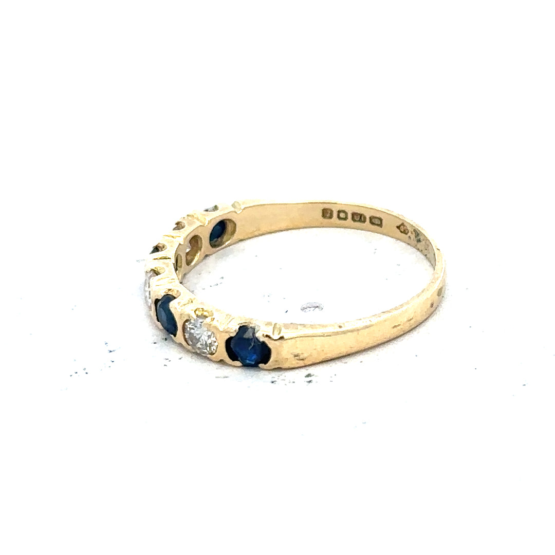 18ct yellow gold diamond and sapphire ring in size M 1/2, showcasing sparkling gemstones and elegant gold band.