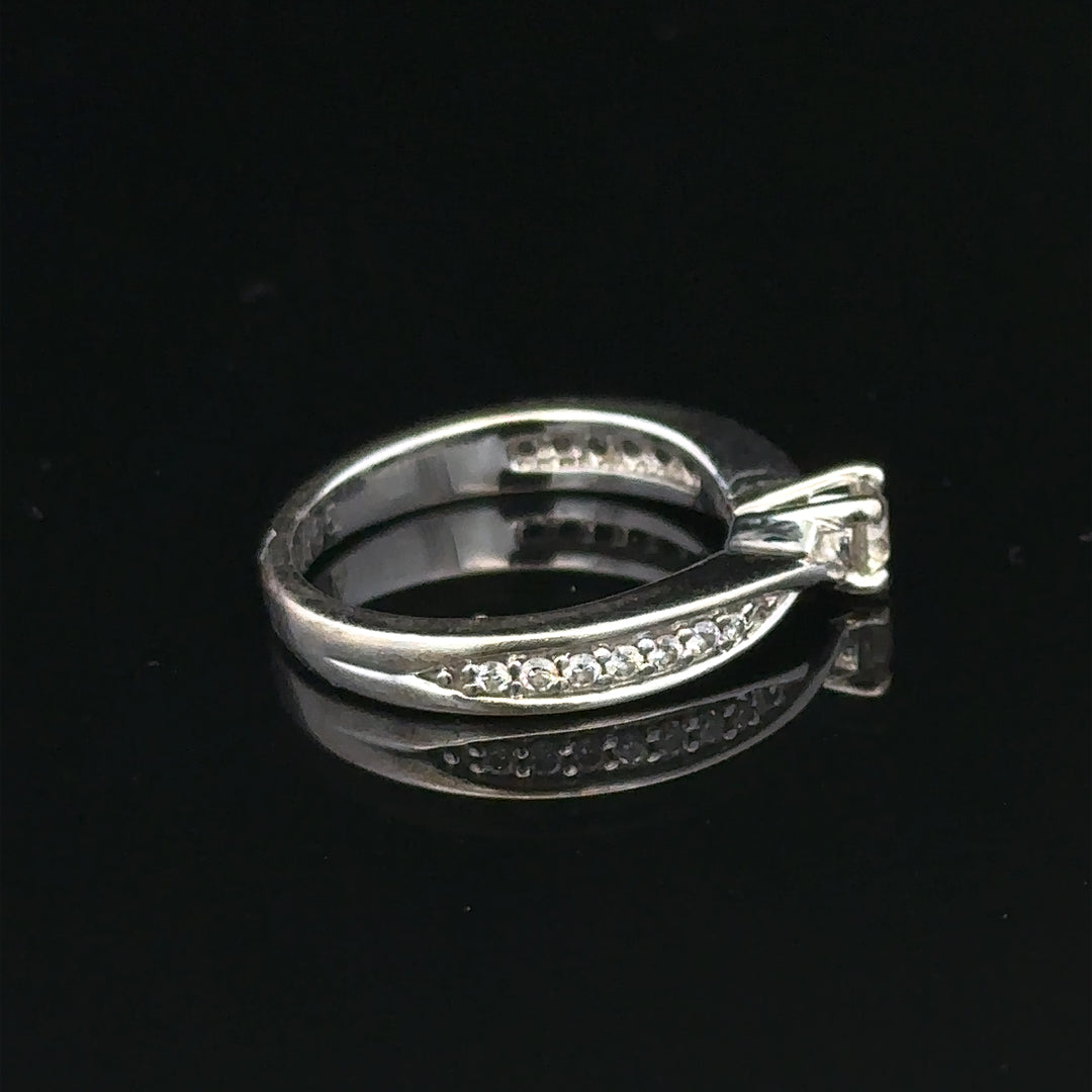 18ct white gold diamond ring with 1/3 carat total weight, size J, featuring a sparkling diamond setting.