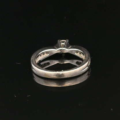 18ct white gold diamond ring with 1/3 carat sparkling diamond, size J, elegant jewelry piece with sleek design.
