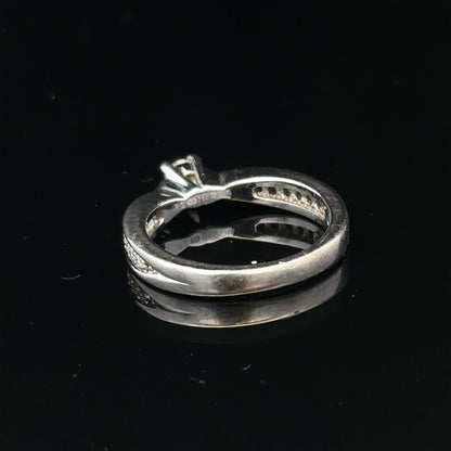 18ct white gold diamond ring with 1/3 carat total weight in size J, featuring a sleek and elegant design.
