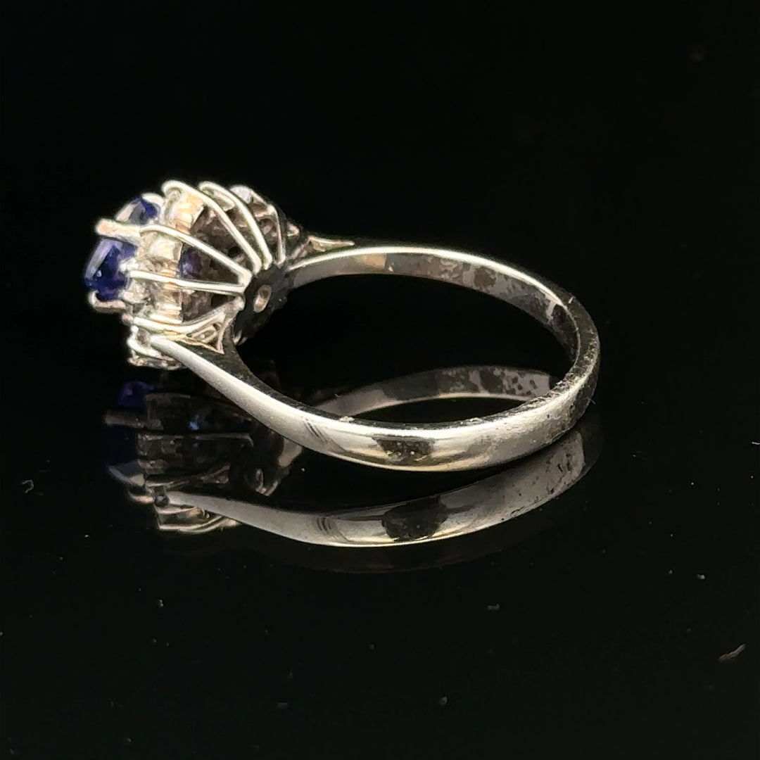 18ct white gold diamond and tanzanite ring in size O, featuring a sparkling central tanzanite gemstone with diamond accents.