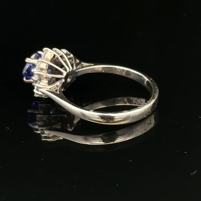 18ct white gold diamond and tanzanite ring in size O, featuring a sparkling central tanzanite gemstone with diamond accents.