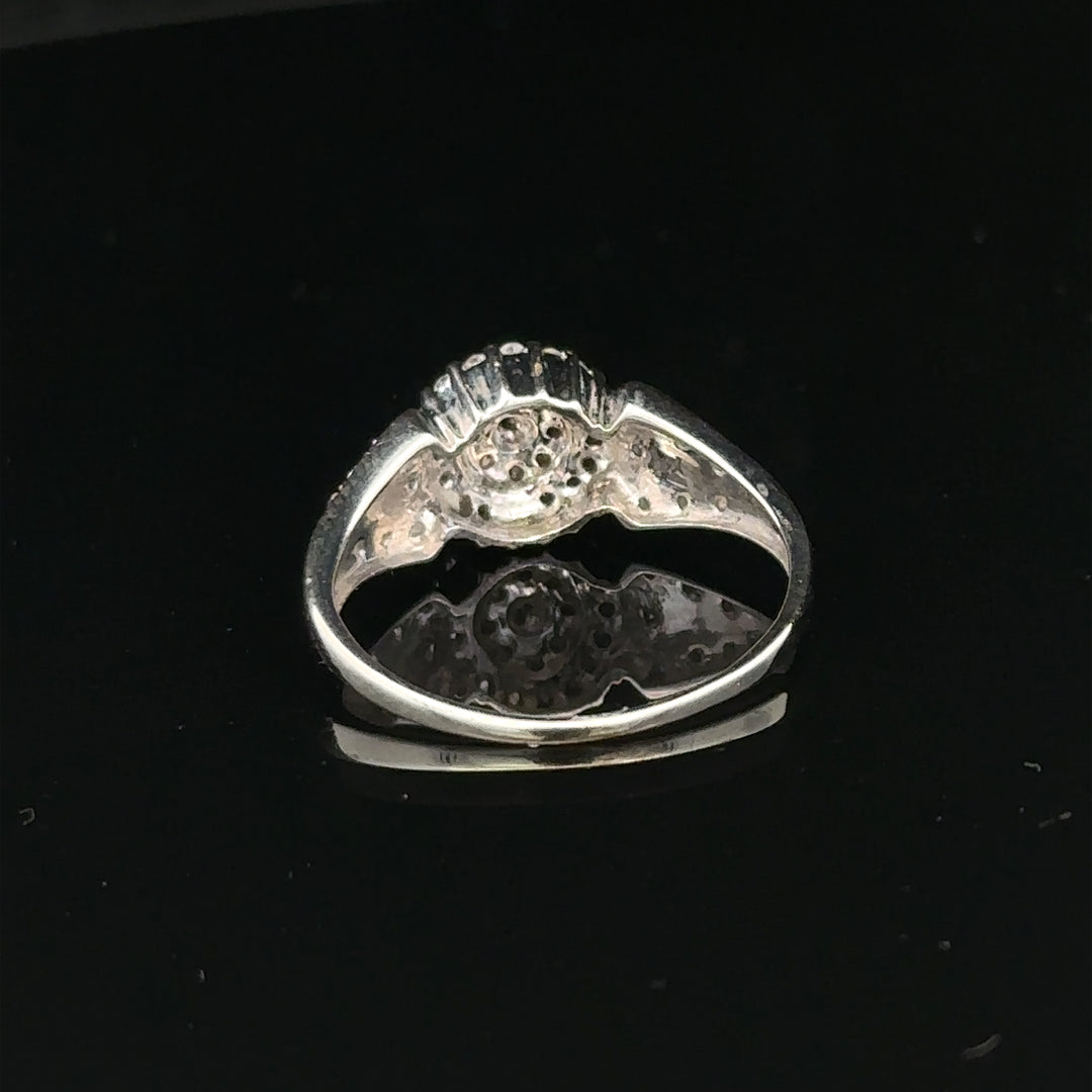 9ct white gold diamond ring in size M, featuring a sparkling diamond setting and weighing 2.6 grams.