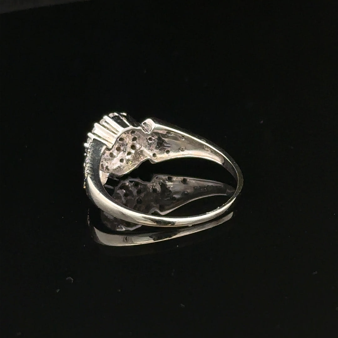 9ct white gold diamond ring with size M and 2.6g weight, featuring sparkling diamonds and a sleek, elegant design.