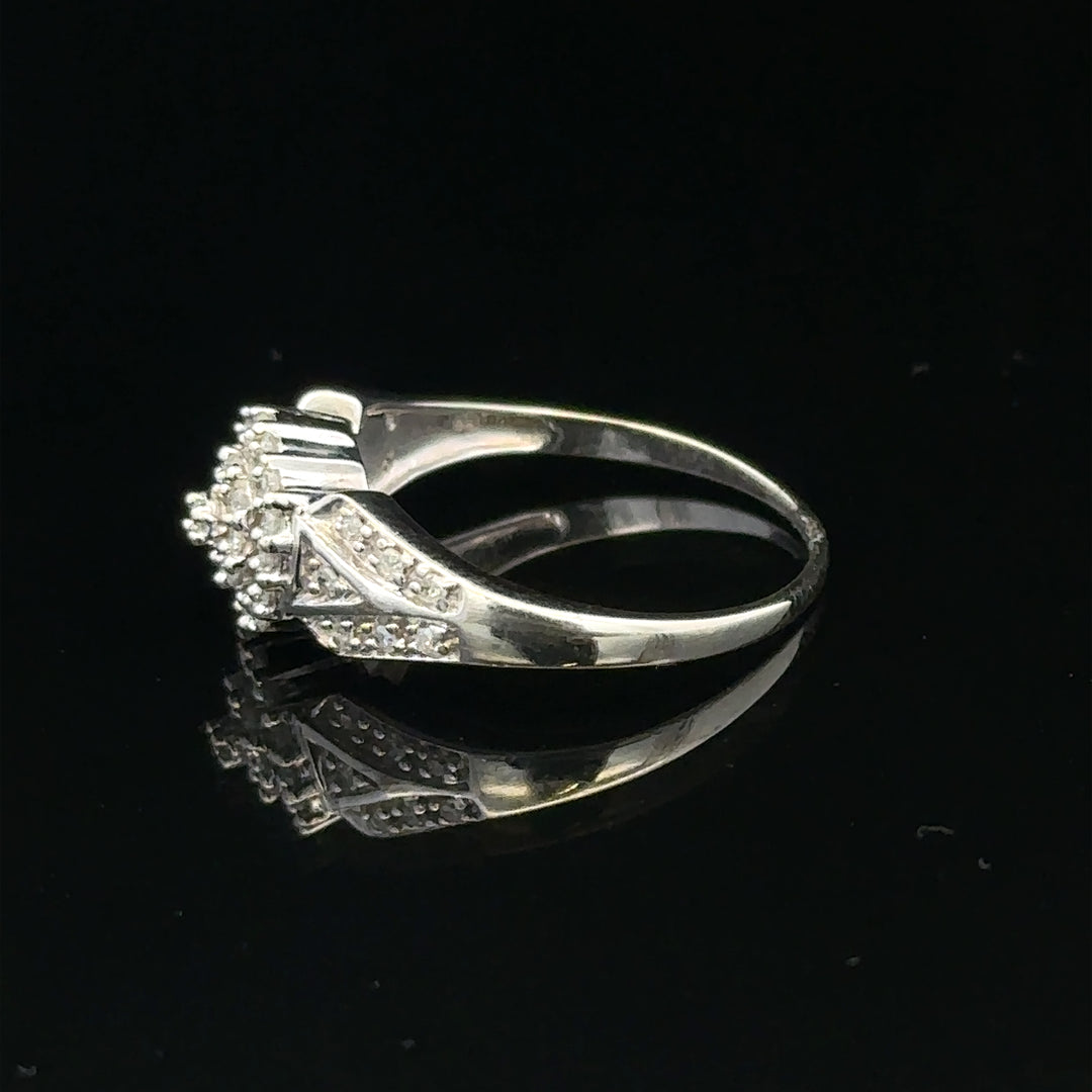9ct white gold diamond ring in size M, featuring sparkling diamonds and a sleek band, weighing 2.6 grams.