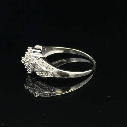 9ct white gold diamond ring in size M, featuring sparkling diamonds and a sleek band, weighing 2.6 grams.