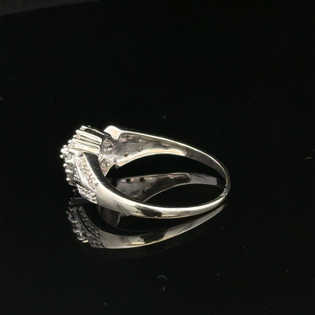 9ct white gold diamond ring in size M, featuring sparkling diamonds and weighing 2.6 grams.