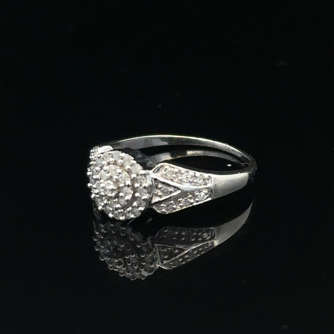 9ct white gold diamond ring in size M with 2.6g, featuring sparkling diamonds and elegant design.